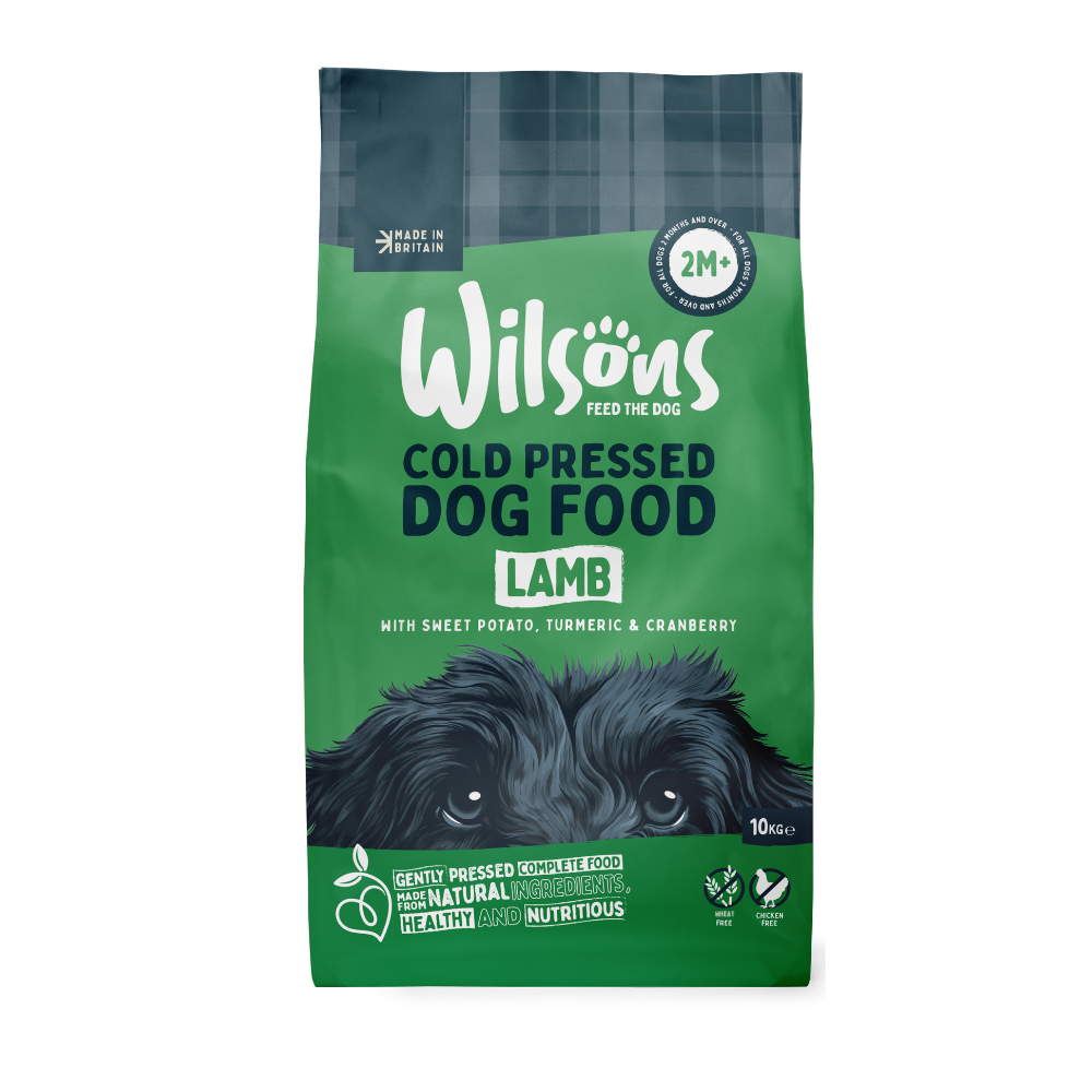 Green bag of Wilsons Lamb Cold Pressed Dog Food with a black dog illustration on a white background