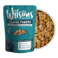 Wilsons Tender Turkey fresh dog food package with a bowl of food on a white background