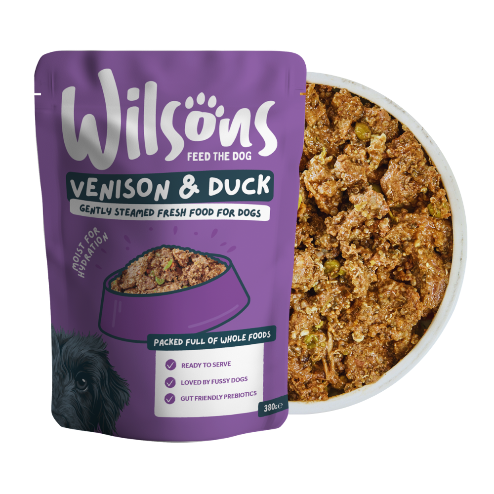 Wilsons Venison & Duck fresh dog food packaging with a bowl of food on a white background
