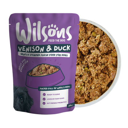 Wilsons Venison & Duck fresh dog food packaging with a bowl of food on a white background