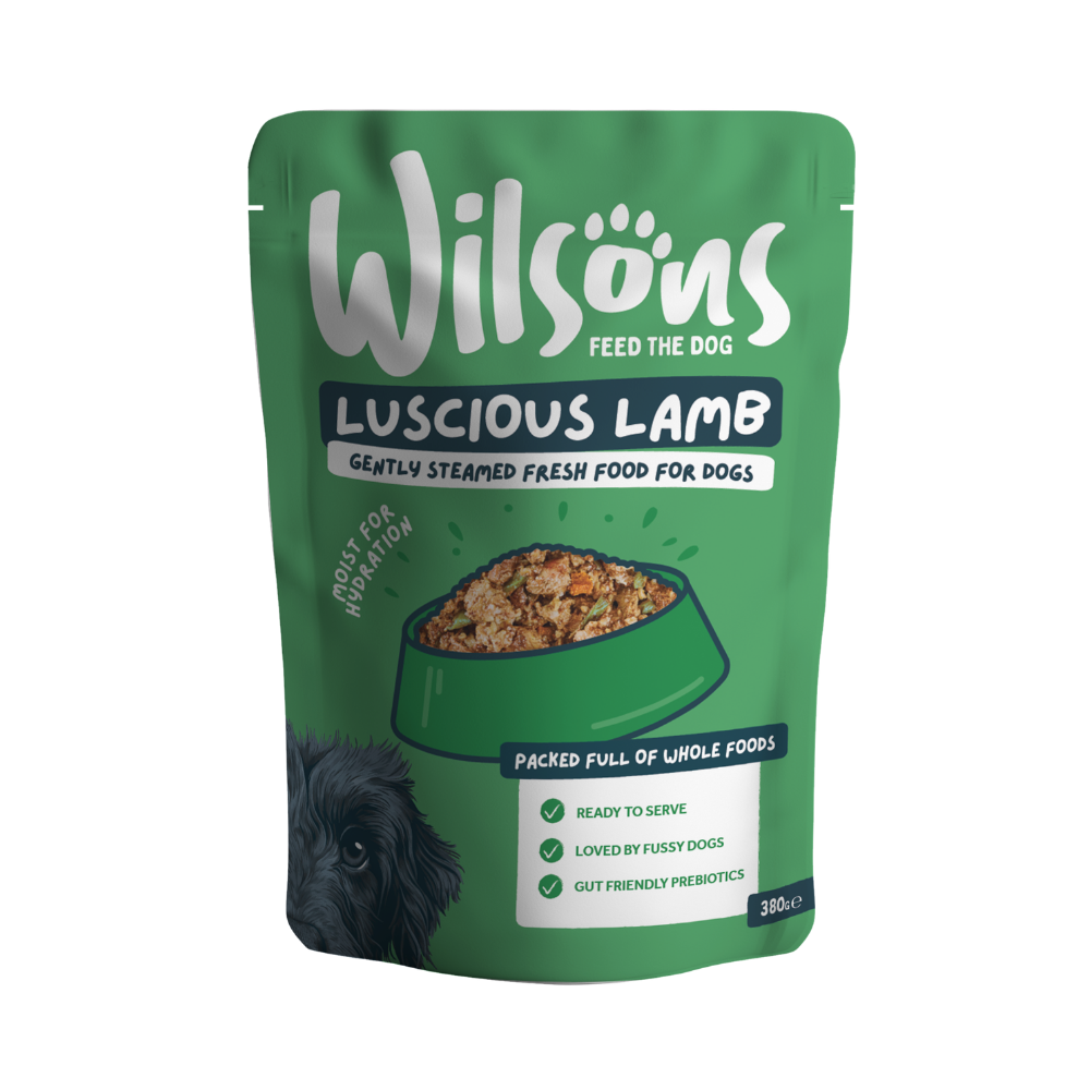 Green package of Wilsons Luscious Lamb fresh dog food on a white background