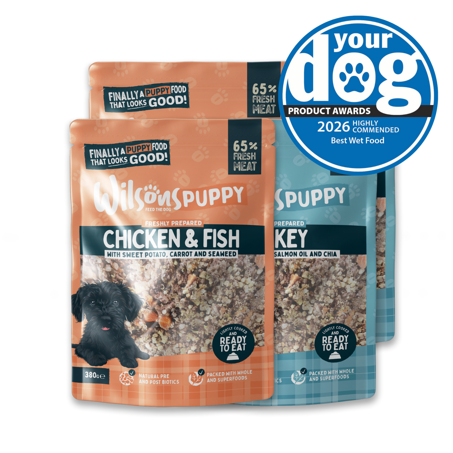 Two packages of Wilson's Puppy food with a 'Your Dog' award badge on a white background