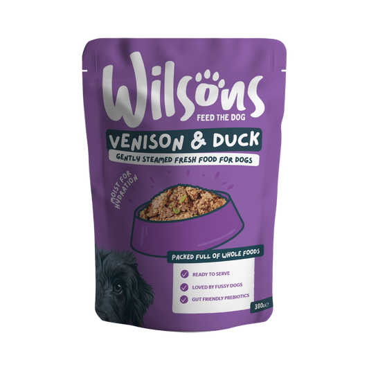 Purple package of Wilsons Venison & Duck fresh dog food on a white background