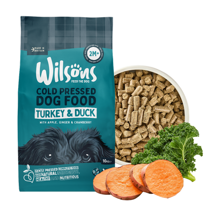 Wilson's cold pressed dog food package with ingredients on a white background
